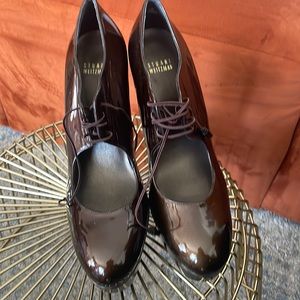 Stuart Weitzman Brown Patent Leather 5” heel with 2” platform.